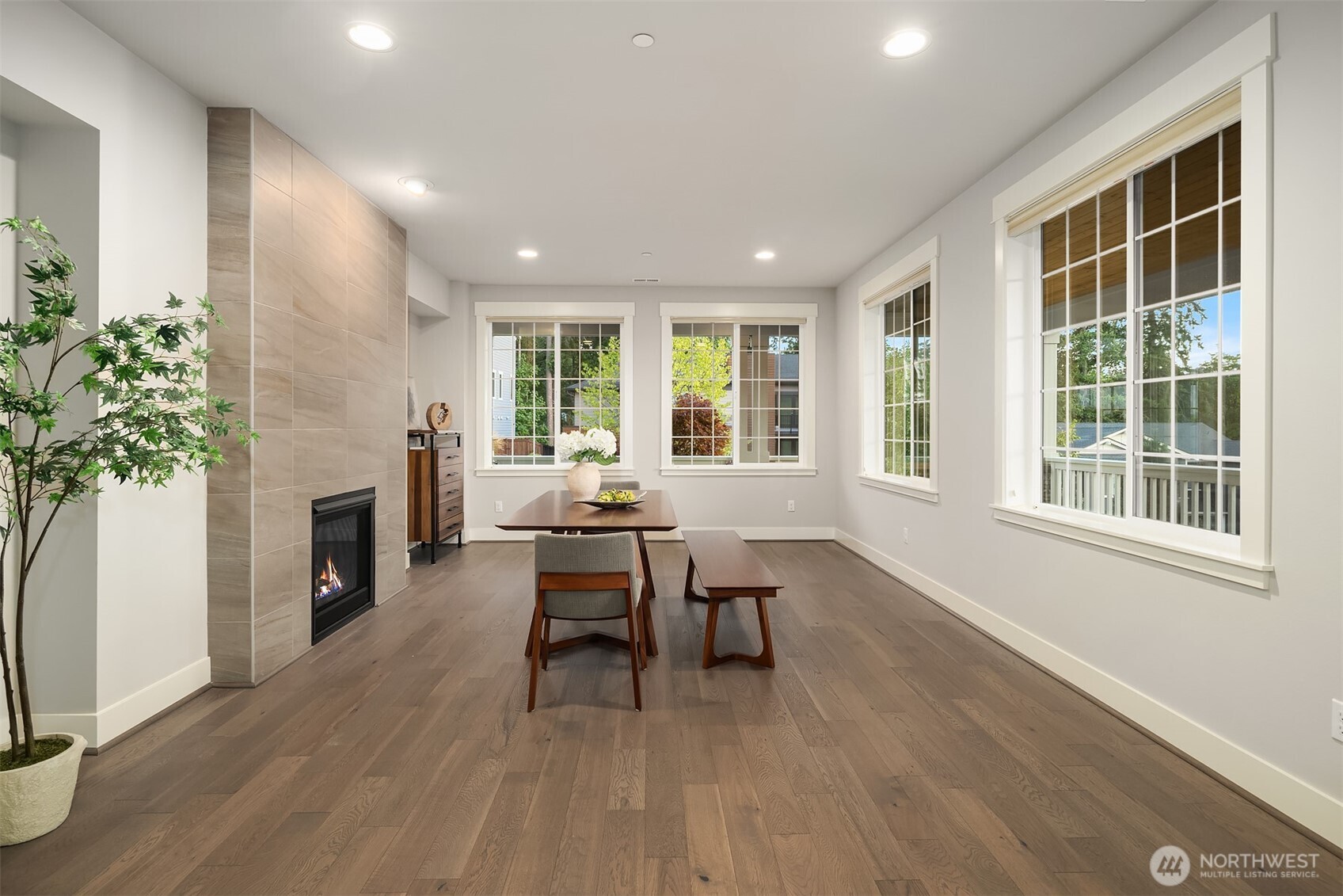 9934 Northeast 162nd Street Bothell, WA 98011 - Photo 5 of 40 a view of a livingroom with furniture and a fireplace