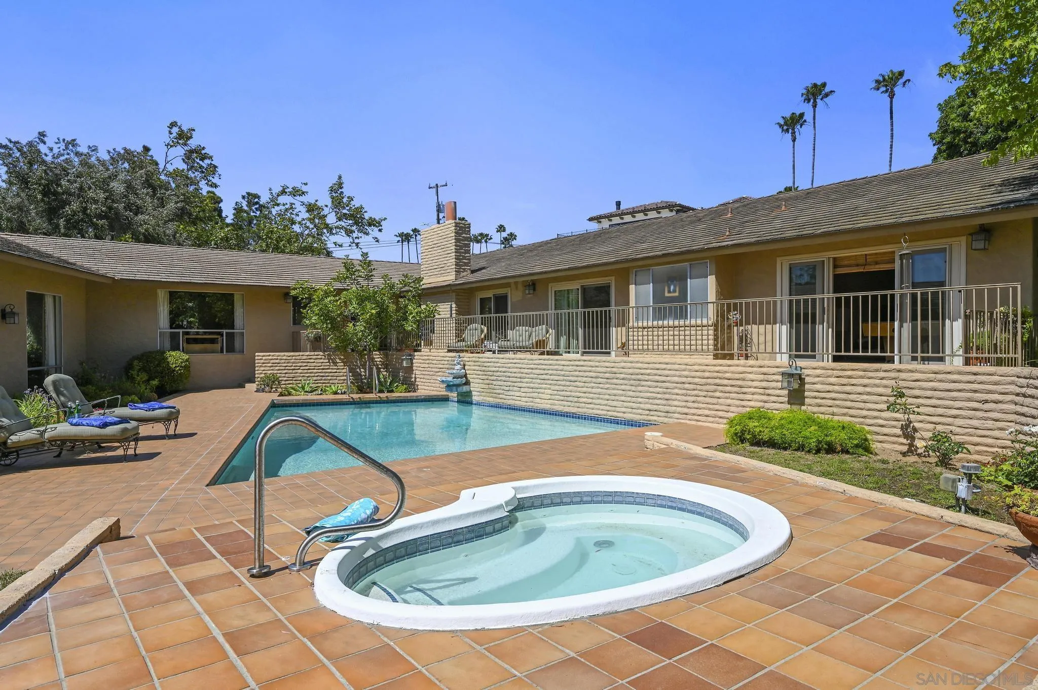 4200 Clearview Drive Carlsbad, CA 92008 - Photo 15 of 73 a view of a house with backyard porch and sitting area