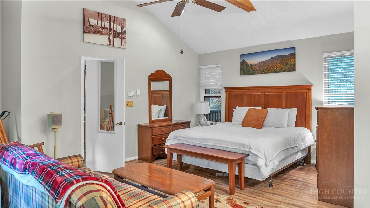 117 Rhododendron Drive Beech Mountain, NC 28604 - Photo 25 of 33 a bedroom with a bed and dresser