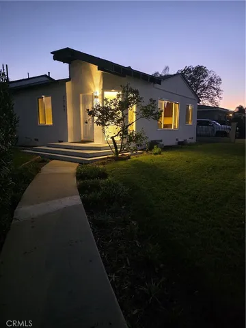 a view of a house with entertaining space