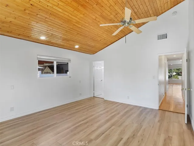 a view of a big room with wooden floor