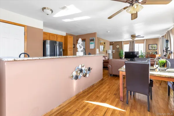 a view of a living room and dining room
