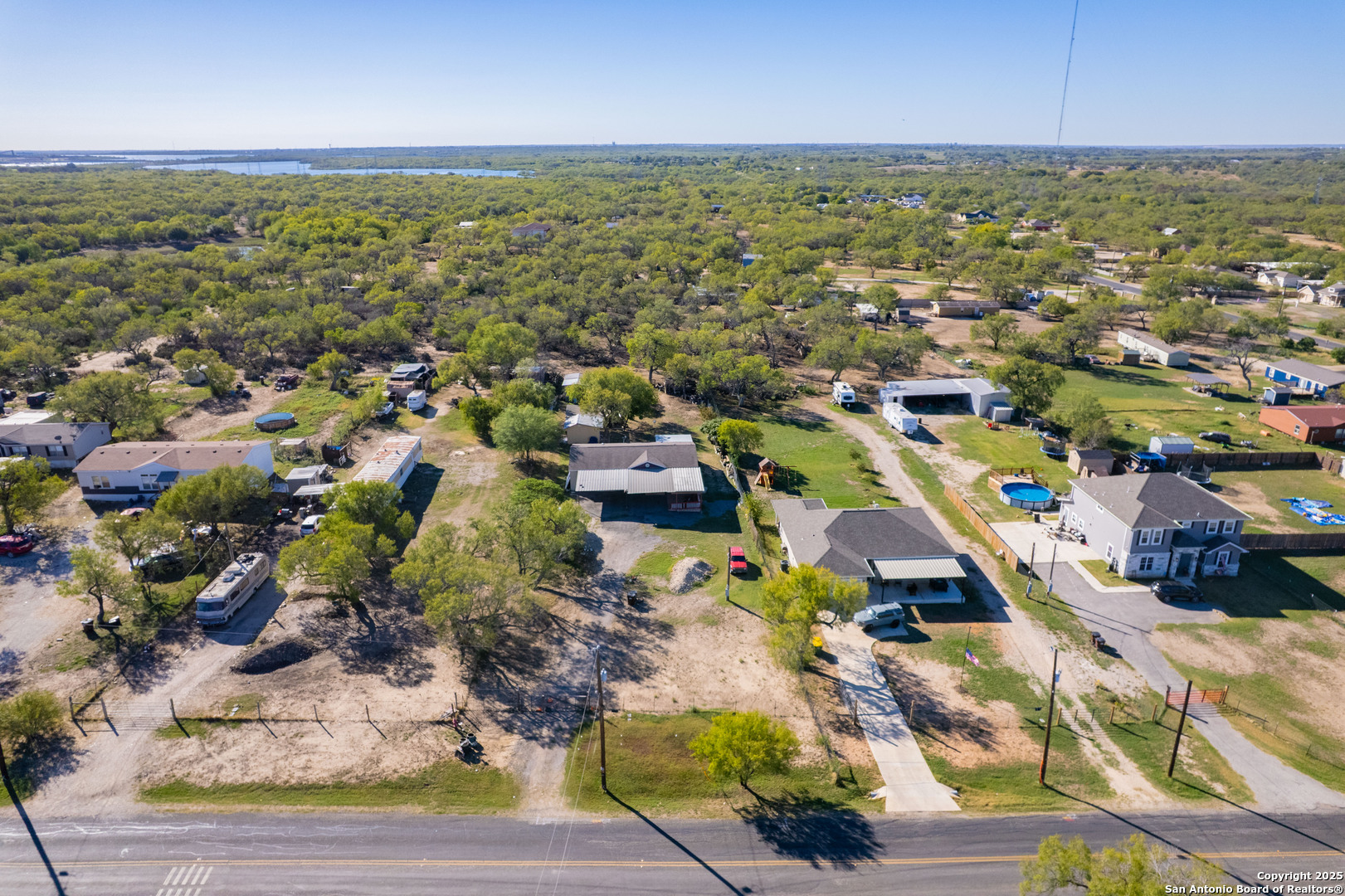 7176 Burshard Road San Antonio, TX 78263 - Photo 3 of 20 an aerial view of residential houses with outdoor space