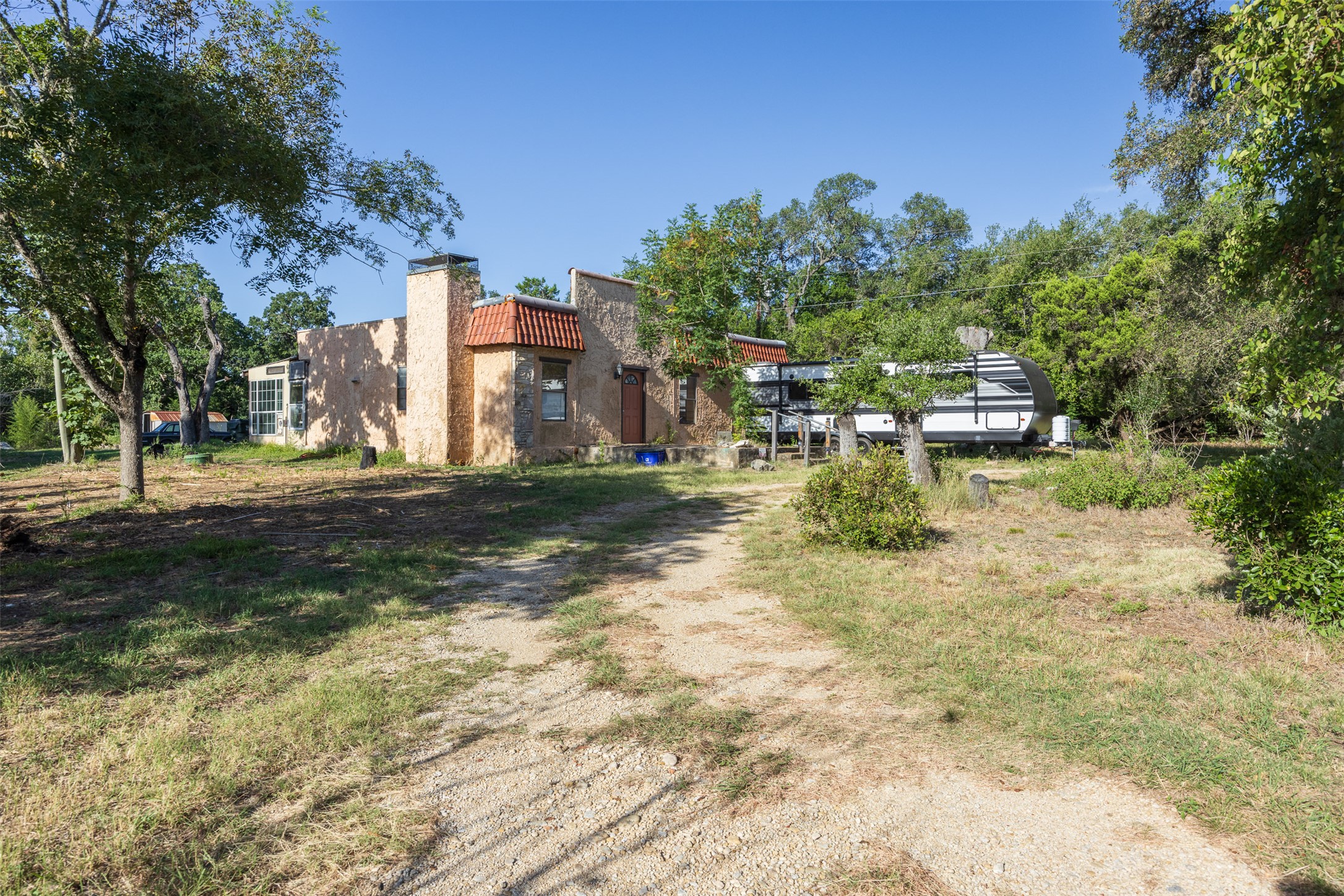 2105 Chaparral Park Road Manchaca, TX 78652 - Photo 2 of 18 a view of a town with barn trees