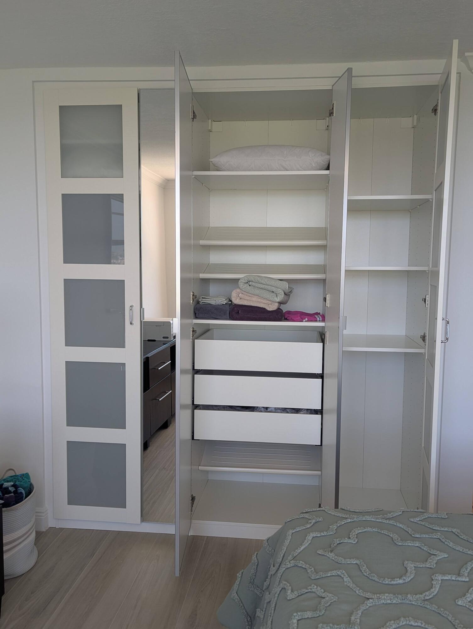 2121 North Ocean Boulevard, Unit 1006E Boca Raton, FL 33431 - Photo 20 of 64 a view of walk in closet with empty racks