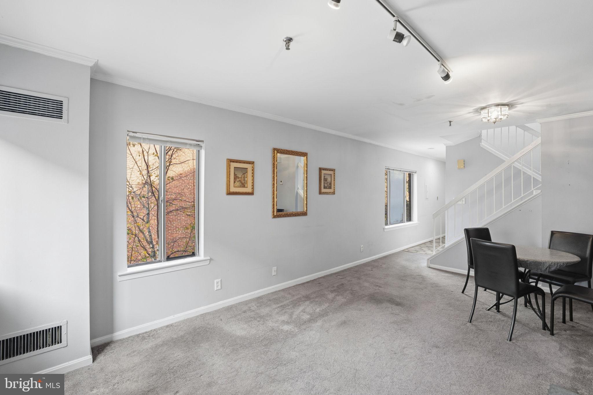 1066 Paper Mill Court, Unit 1066 Washington, DC 20007 - Photo 5 of 25 Living and dining area