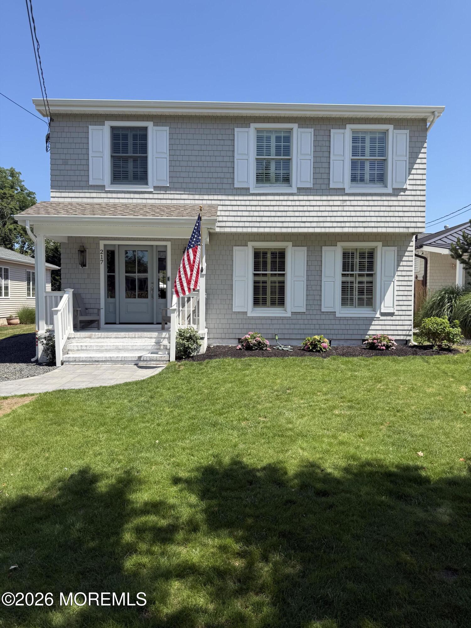 217 Howe Street Point Pleasant, NJ 08742 - Photo 3 of 29 a front view of house with yard and green space
