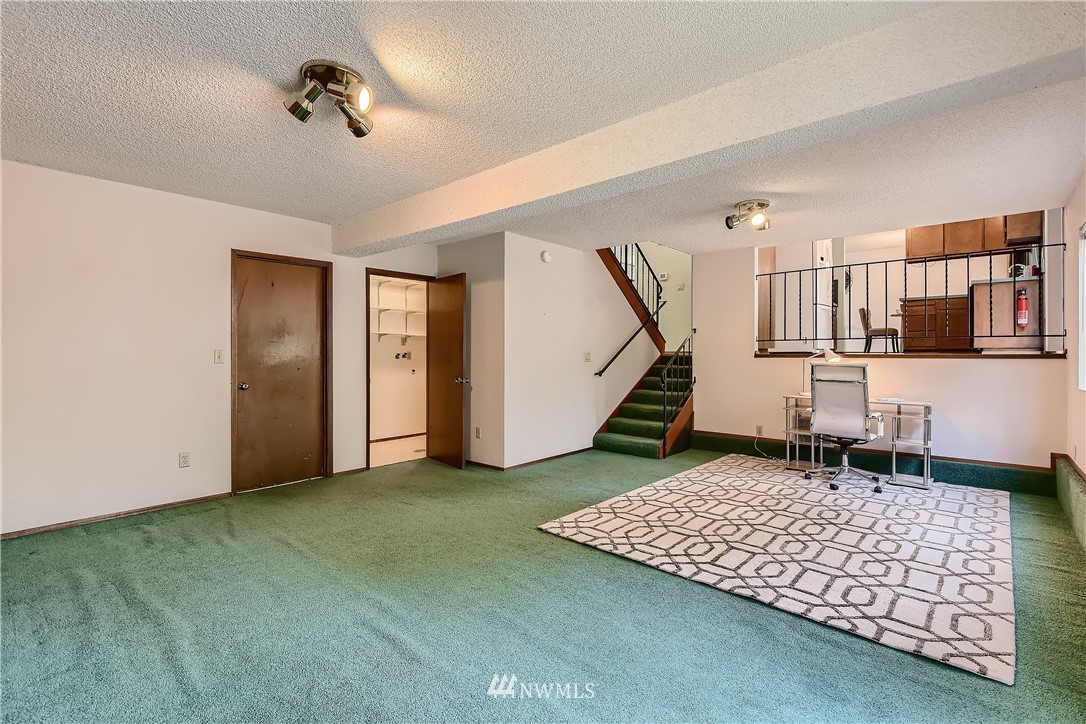 3 156th Place Southwest Bothell, WA 98012 - Photo 14 of 27 a view of an empty room with stairs