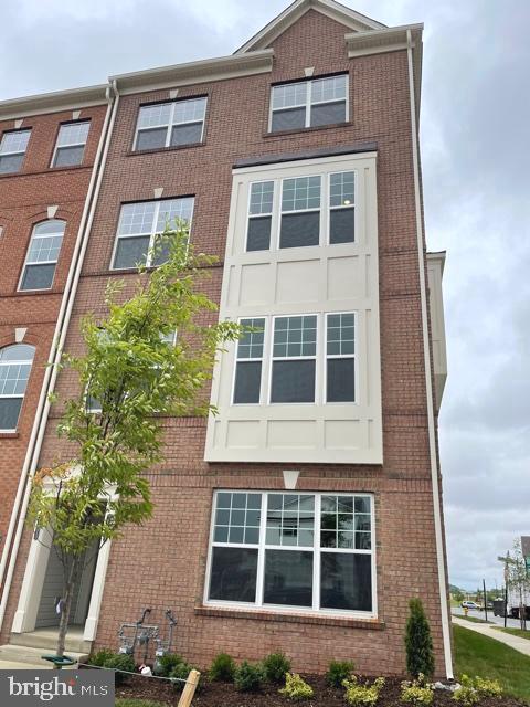 7103 Delegate Place Frederick, MD 21703 - Photo 2 of 42 front view of a building