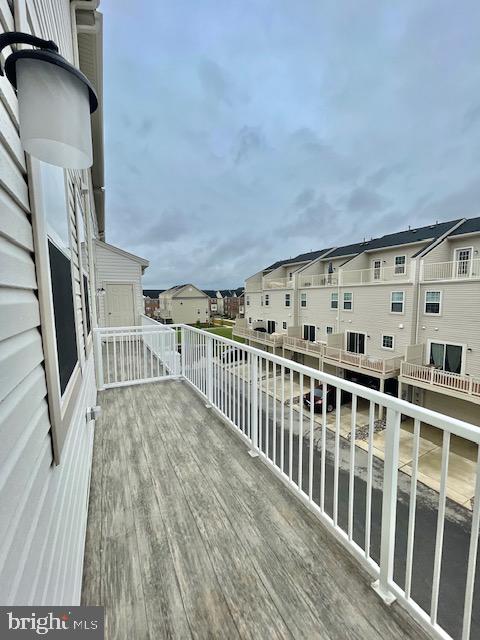 7103 Delegate Place Frederick, MD 21703 - Photo 22 of 42 a view of a balcony with wooden floor