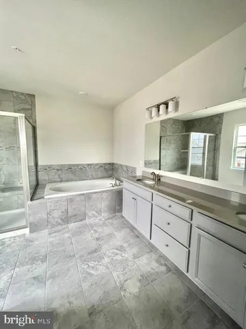 an empty room with closet area