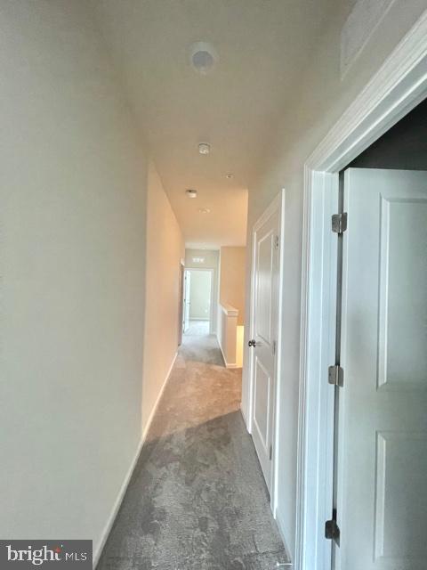 7103 Delegate Place Frederick, MD 21703 - Photo 25 of 42 a view of a hallway with a bathroom