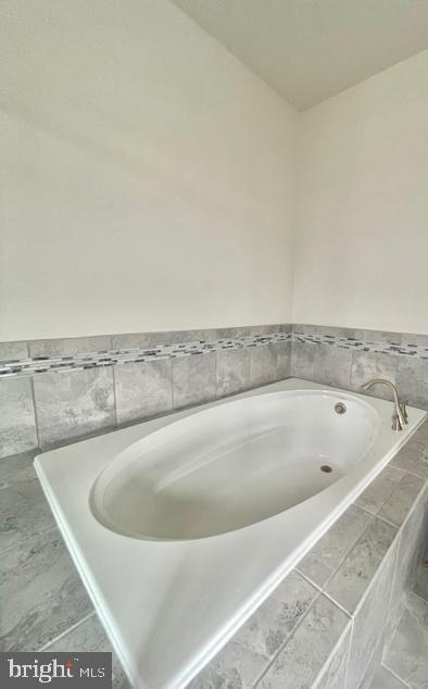 7103 Delegate Place Frederick, MD 21703 - Photo 31 of 42 a view of a bathtub in a bathroom