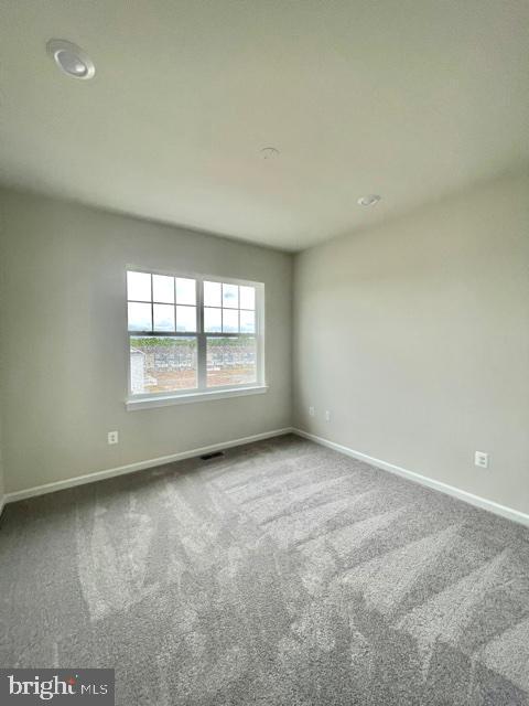 7103 Delegate Place Frederick, MD 21703 - Photo 37 of 42 an empty room with windows