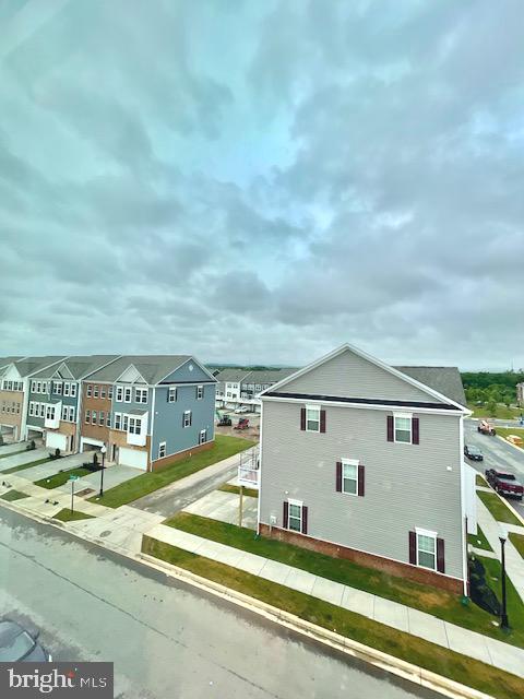 7103 Delegate Place Frederick, MD 21703 - Photo 40 of 42 a view of a big yard in front of the house