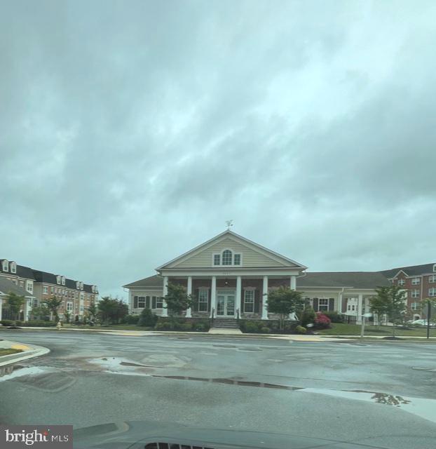 7103 Delegate Place Frederick, MD 21703 - Photo 42 of 42 a front view of a house with a yard