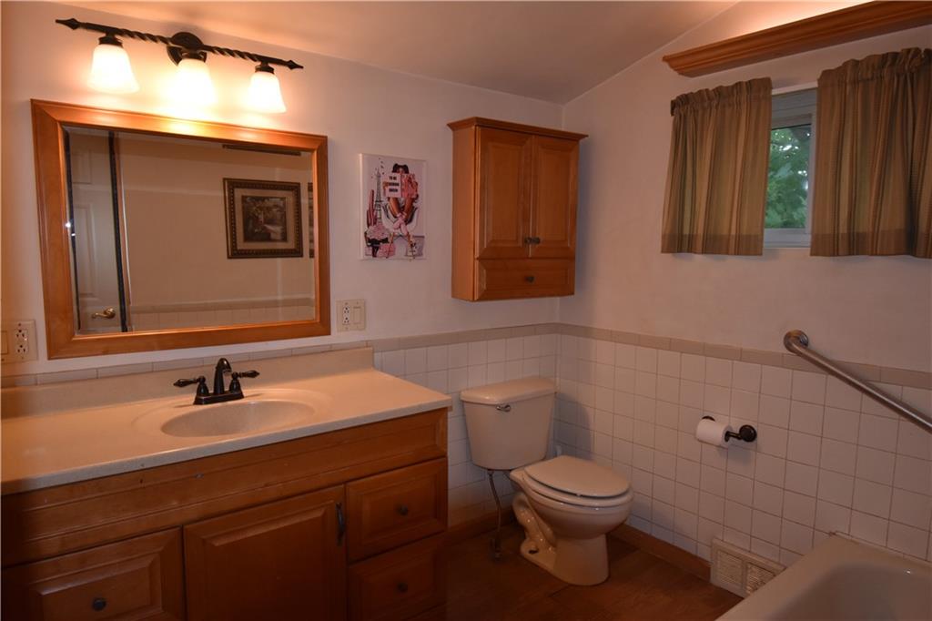 128 Hartrey Street Springdale, PA 15144 - Photo 23 of 32 The upstairs bath is large and has closets for linens