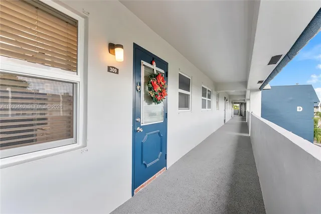 a view of a hallway with entryway
