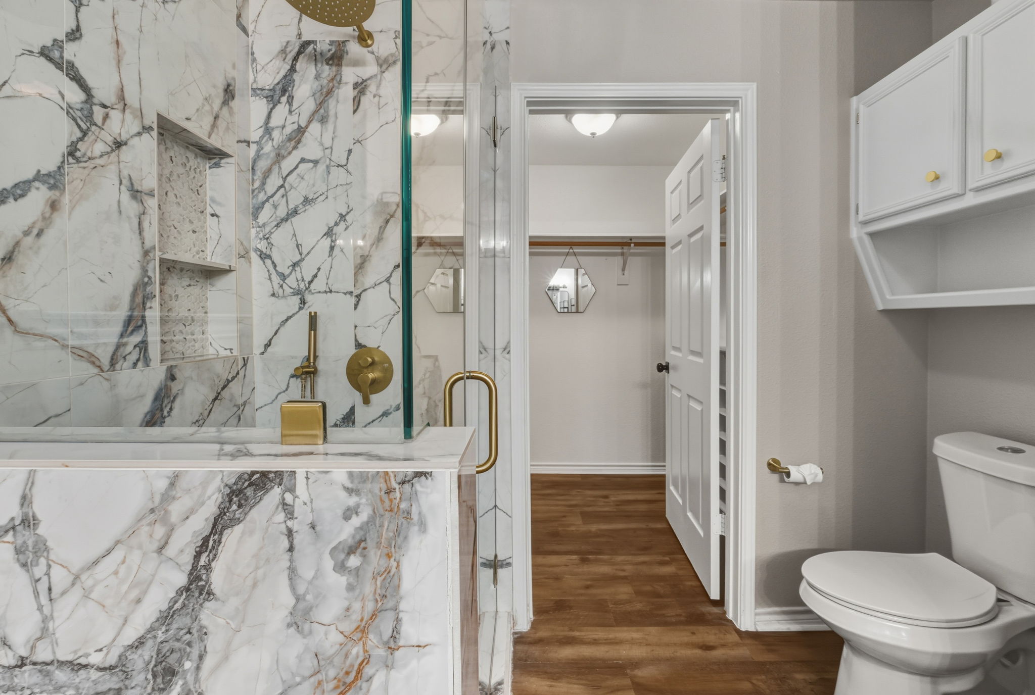 20808 Sandy Brown Lane Webberville, TX 78621 - Photo 18 of 40 a bathroom with a toilet and a shower