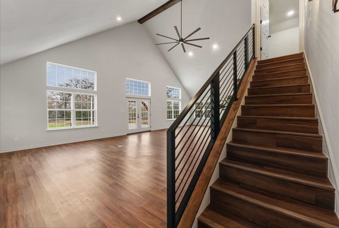 20808 Sandy Brown Lane Webberville, TX 78621 - Photo 34 of 40 wooden floor in an empty room with a window