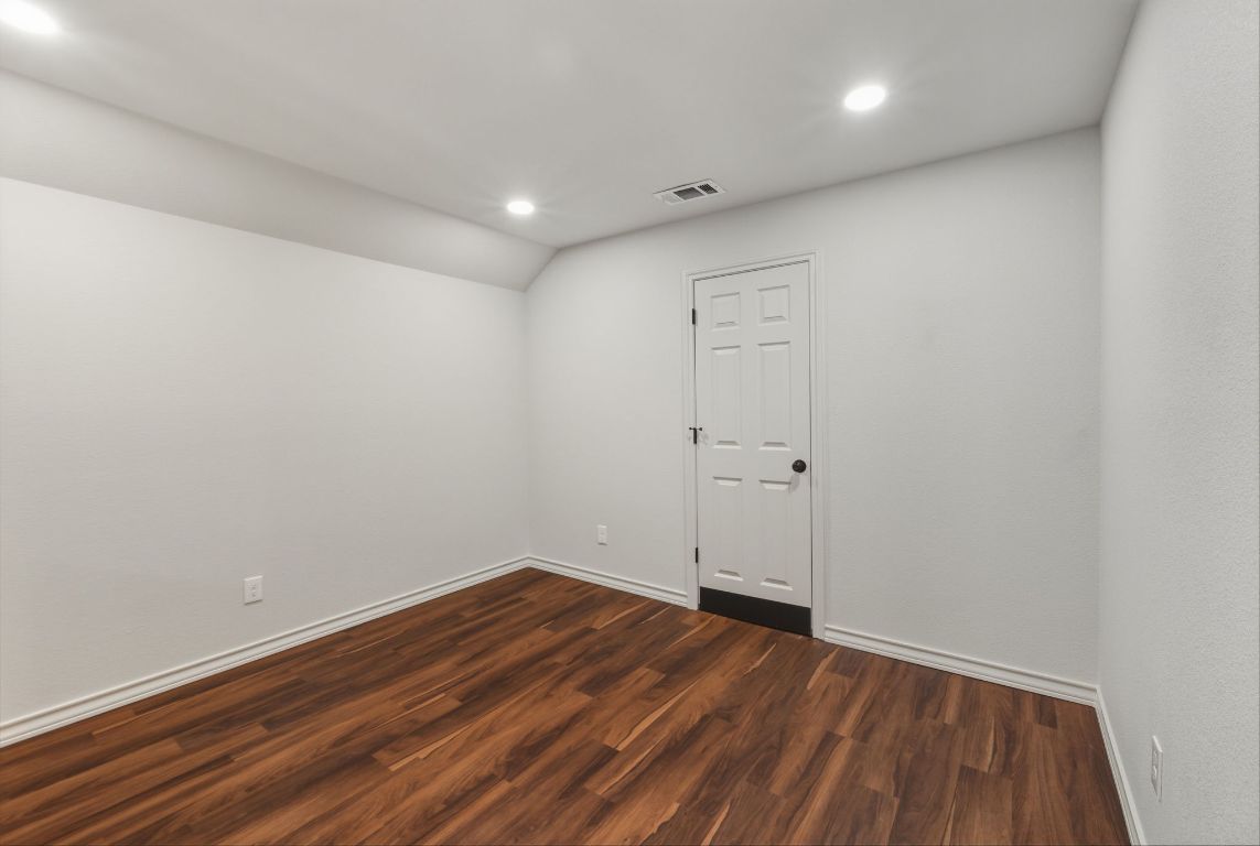 20808 Sandy Brown Lane Webberville, TX 78621 - Photo 35 of 40 a view of room with wooden floor