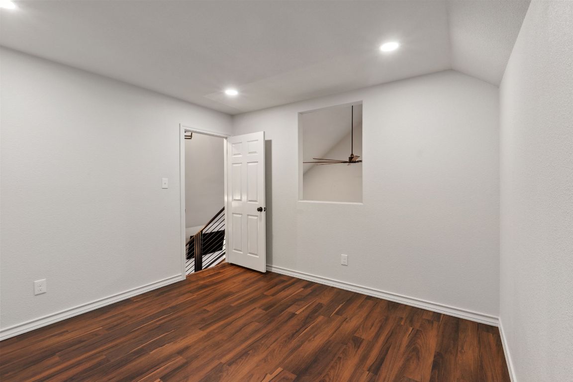 20808 Sandy Brown Lane Webberville, TX 78621 - Photo 36 of 40 a view of empty room with wooden floor