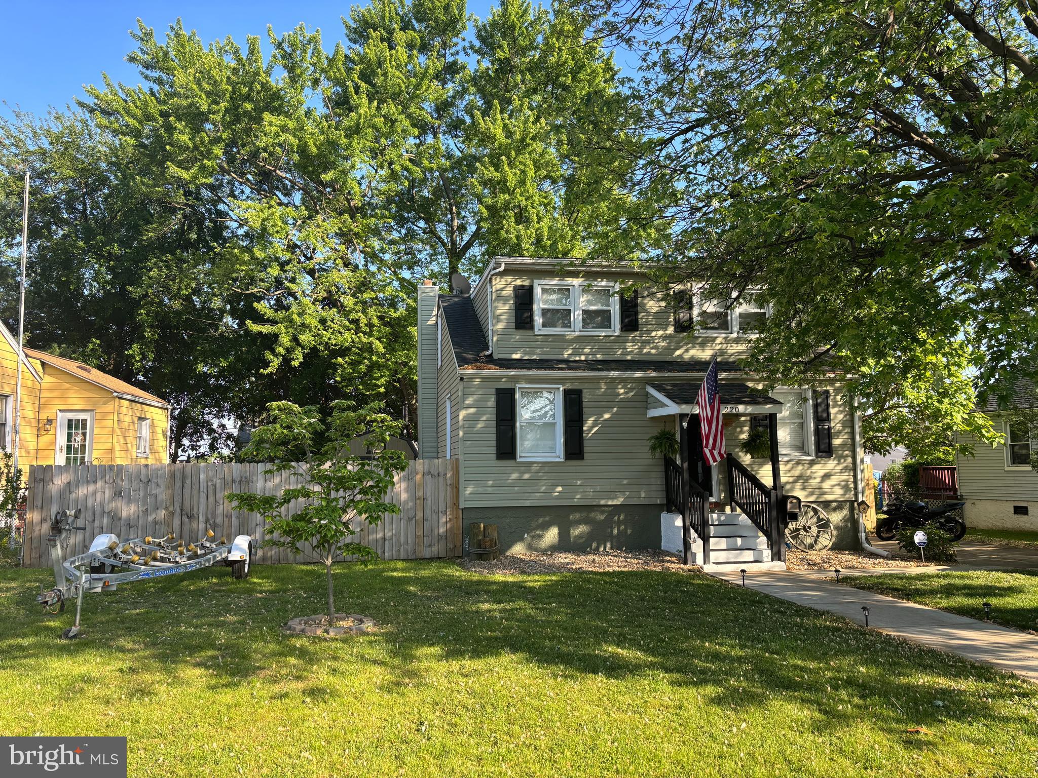 220 Pinewood Road Baltimore, MD 21222 - Photo 41 of 45 a front view of a house with a yard