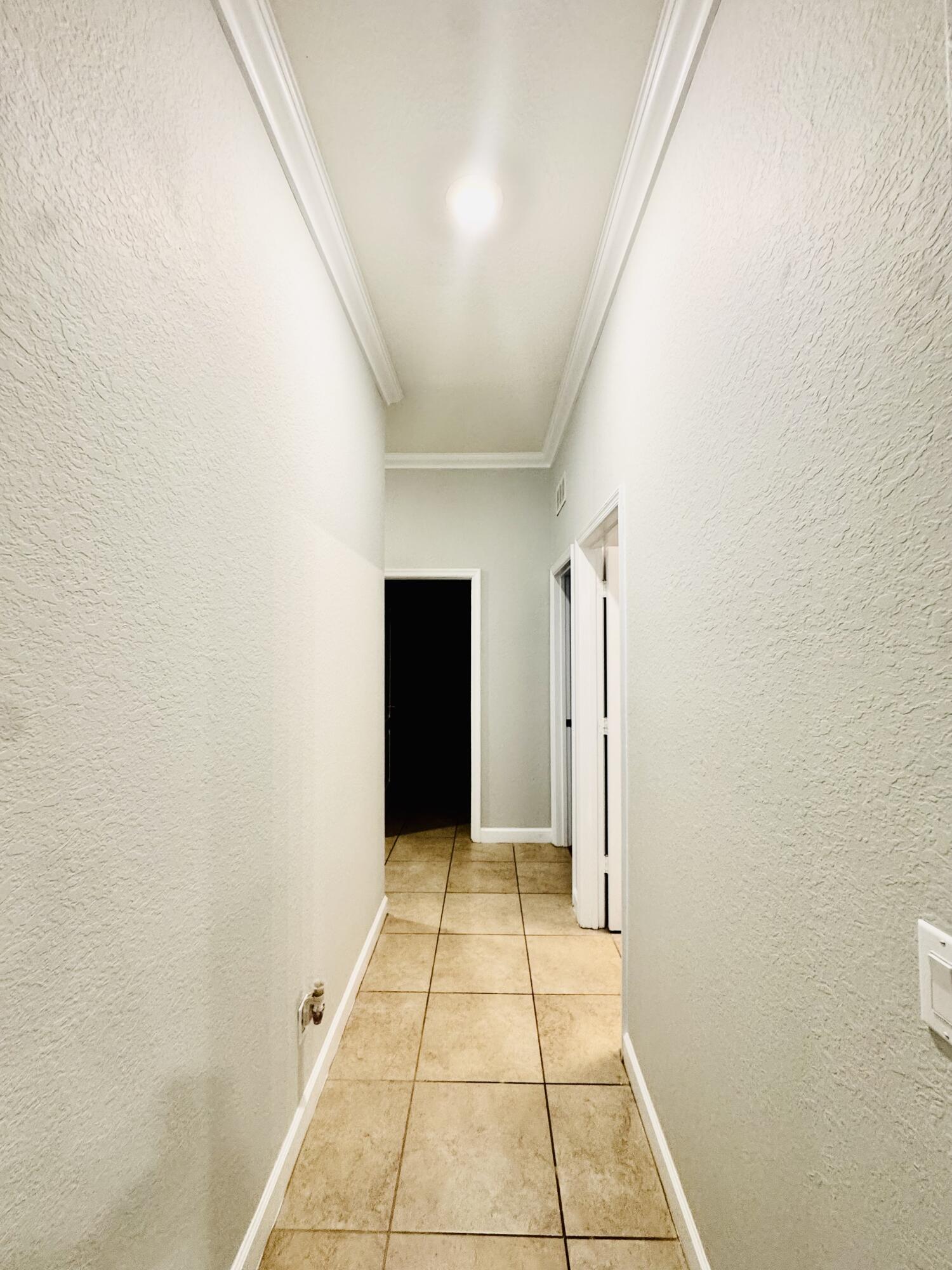 1807 Berkshire Circle Southwest Vero Beach, FL 32968 - Photo 15 of 22 a view of an empty room