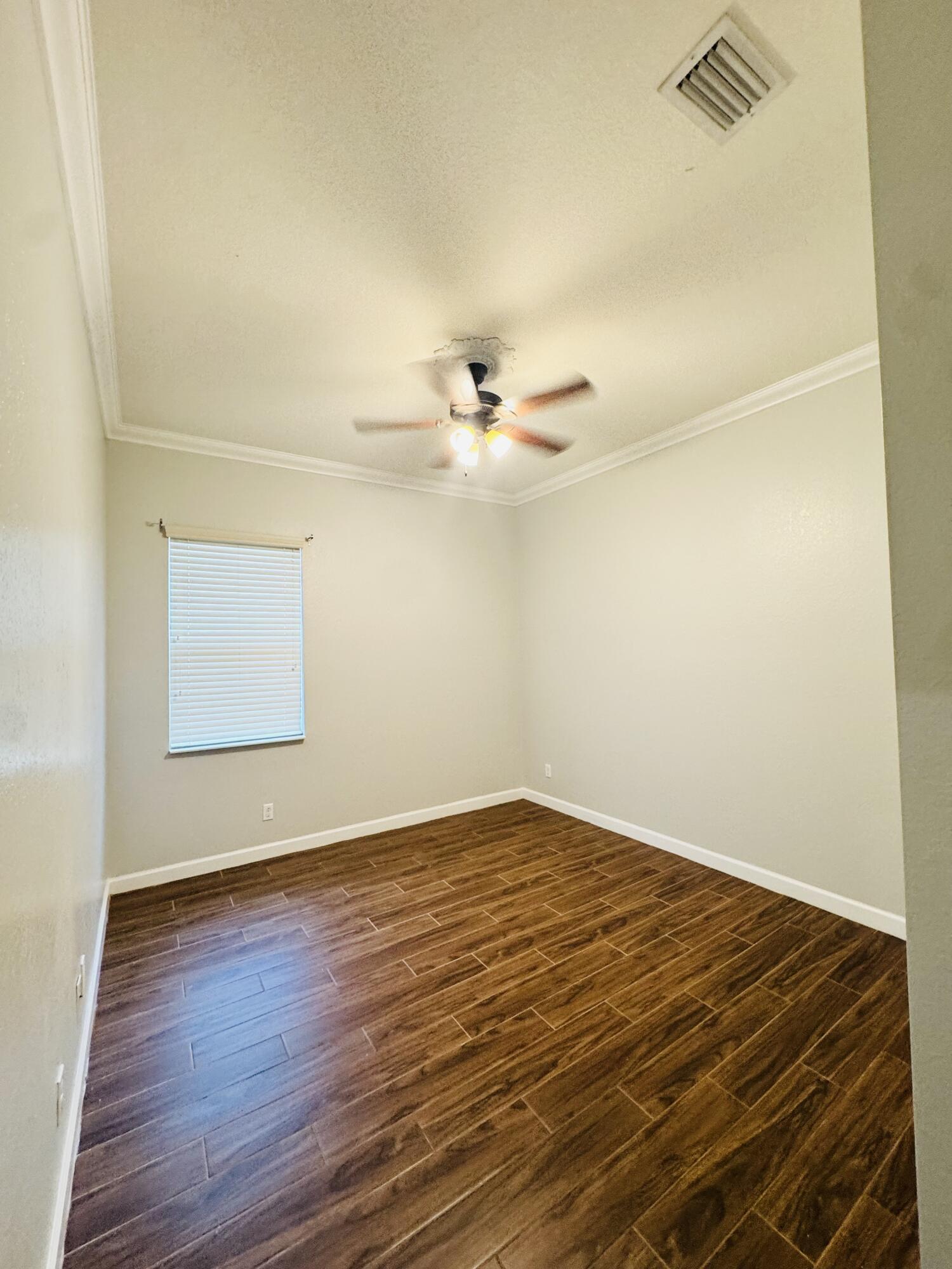 1807 Berkshire Circle Southwest Vero Beach, FL 32968 - Photo 5 of 22 a view of an empty room