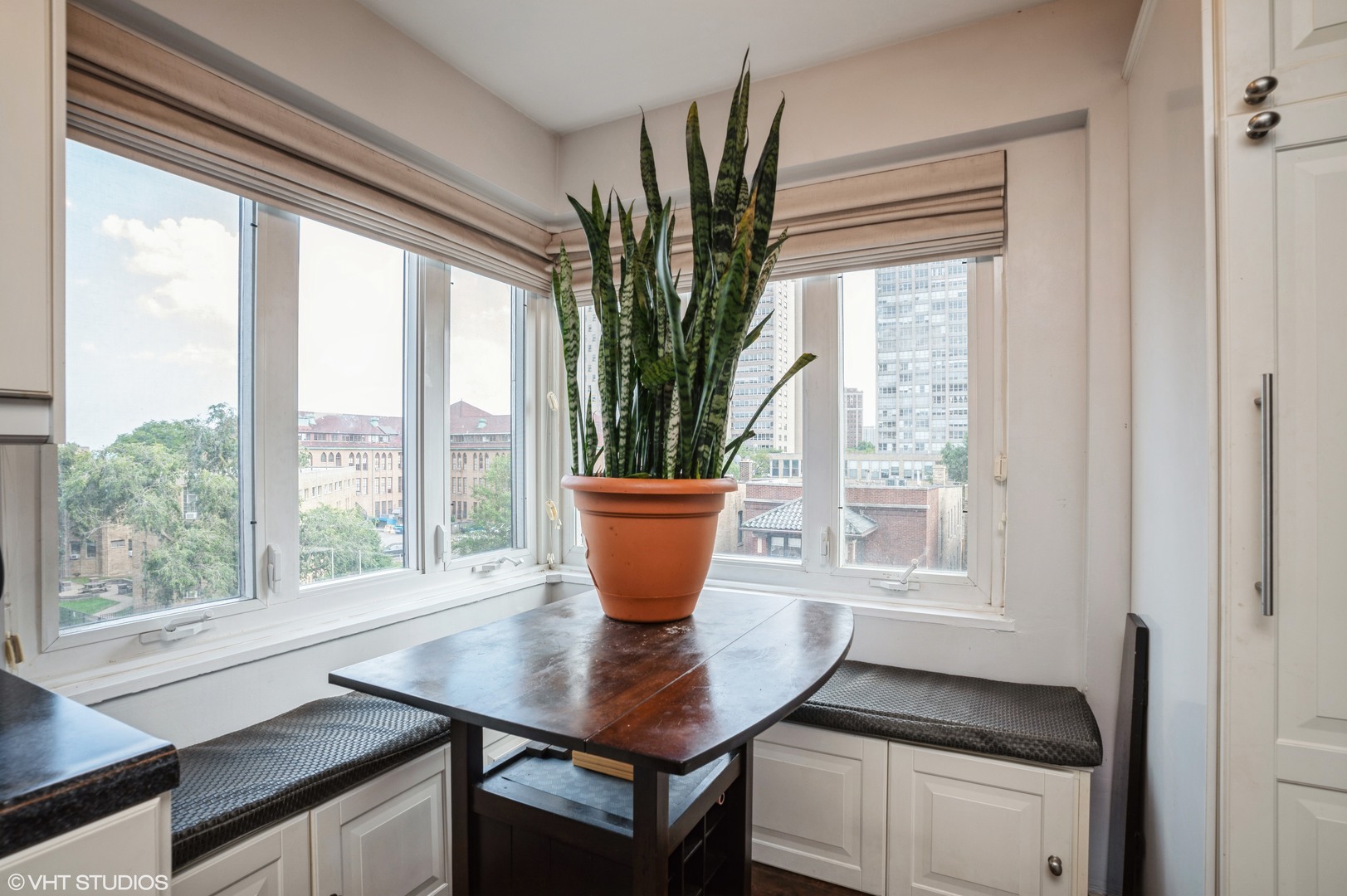 700 West Bittersweet Place, Unit 506 Chicago, IL 60613 - Photo 6 of 11 a view of a room with a window and wooden floor