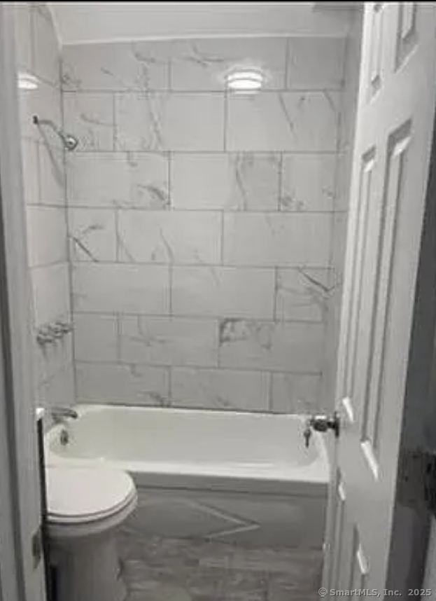 343 Pearl Street Bridgeport, CT 06608 - Photo 3 of 3 a bathroom with a bathtub and a toilet