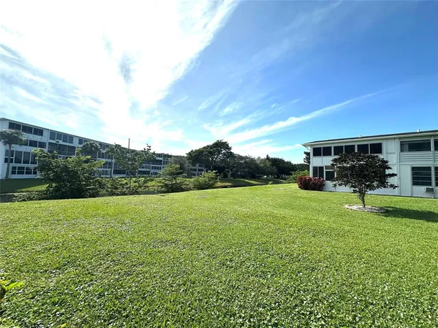 a view of outdoor space and yard