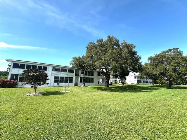 a view of a backyard with garden