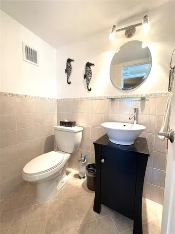 a view of a garden with palm trees