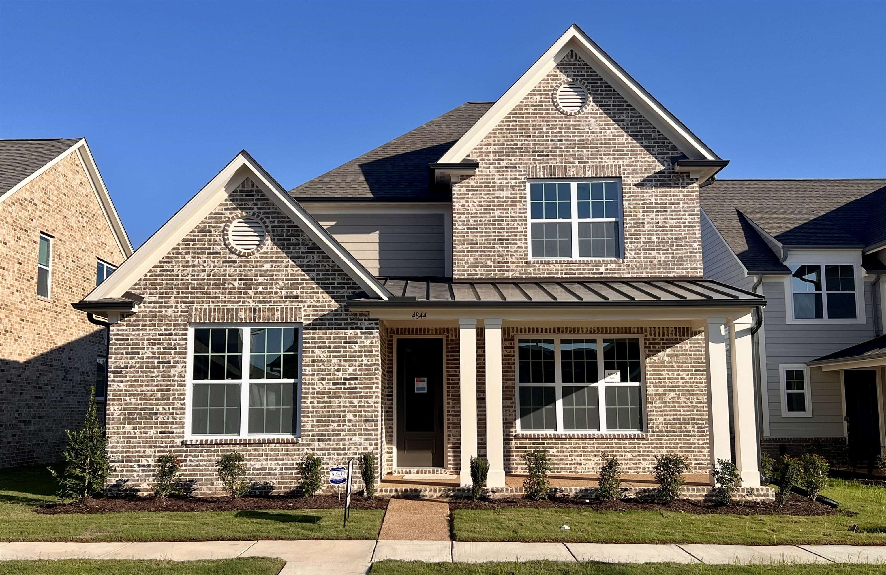 4844 Lyla Lane Collierville, TN 38017 - Photo 1 of 31 front view of a house with a yard