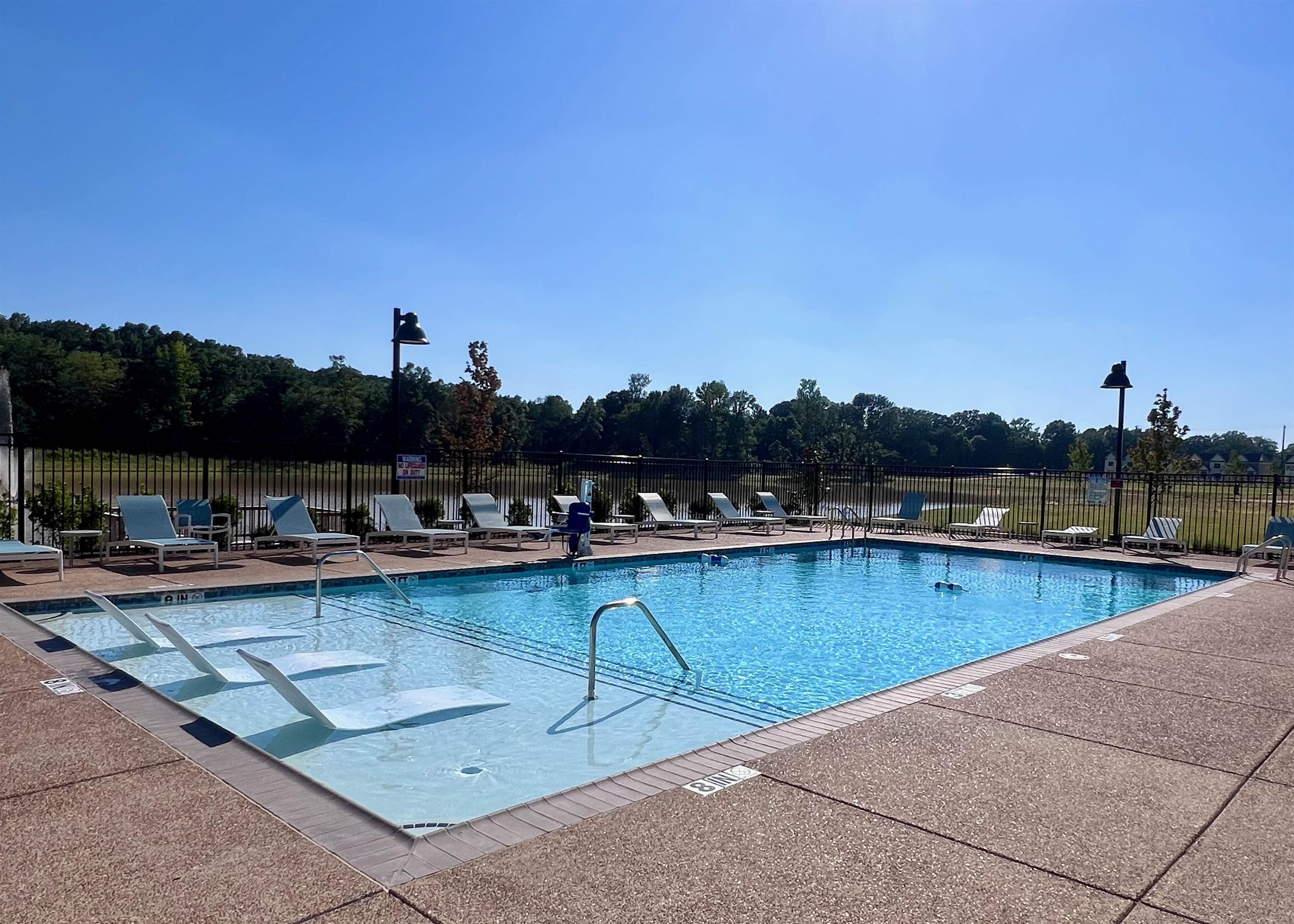 4844 Lyla Lane Collierville, TN 38017 - Photo 31 of 31 a view of a swimming pool with lounge chair