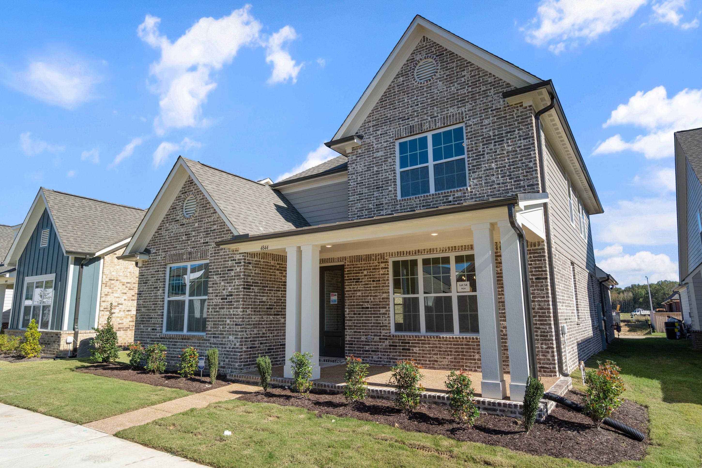 4844 Lyla Lane Collierville, TN 38017 - Photo 4 of 31 a front view of a house with a yard