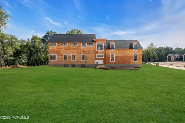 a view of a house with a big yard