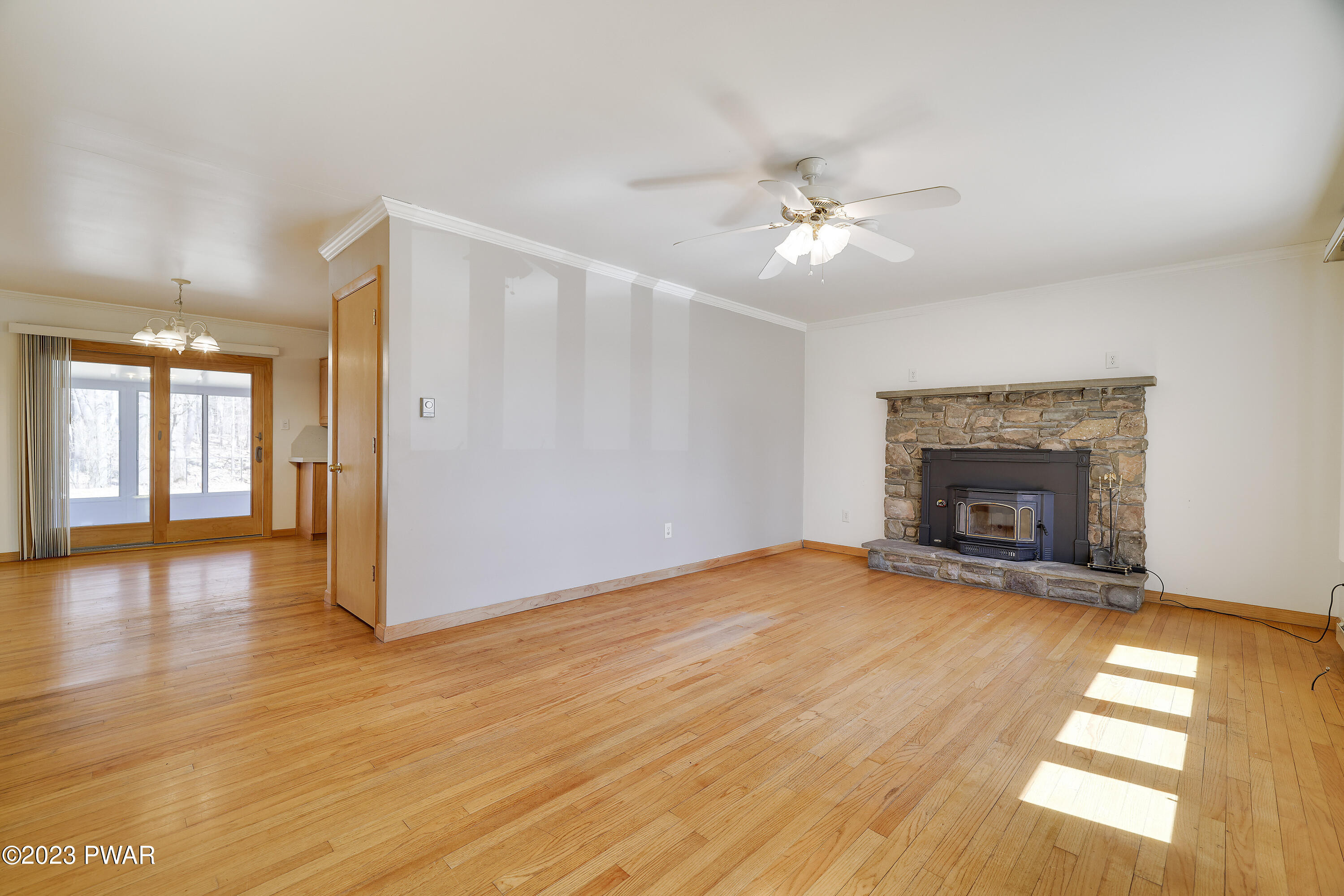 141 Lake In The Clouds Road Canadensis, PA 18325 - Photo 10 of 57 Living Room w Wood Fireplace