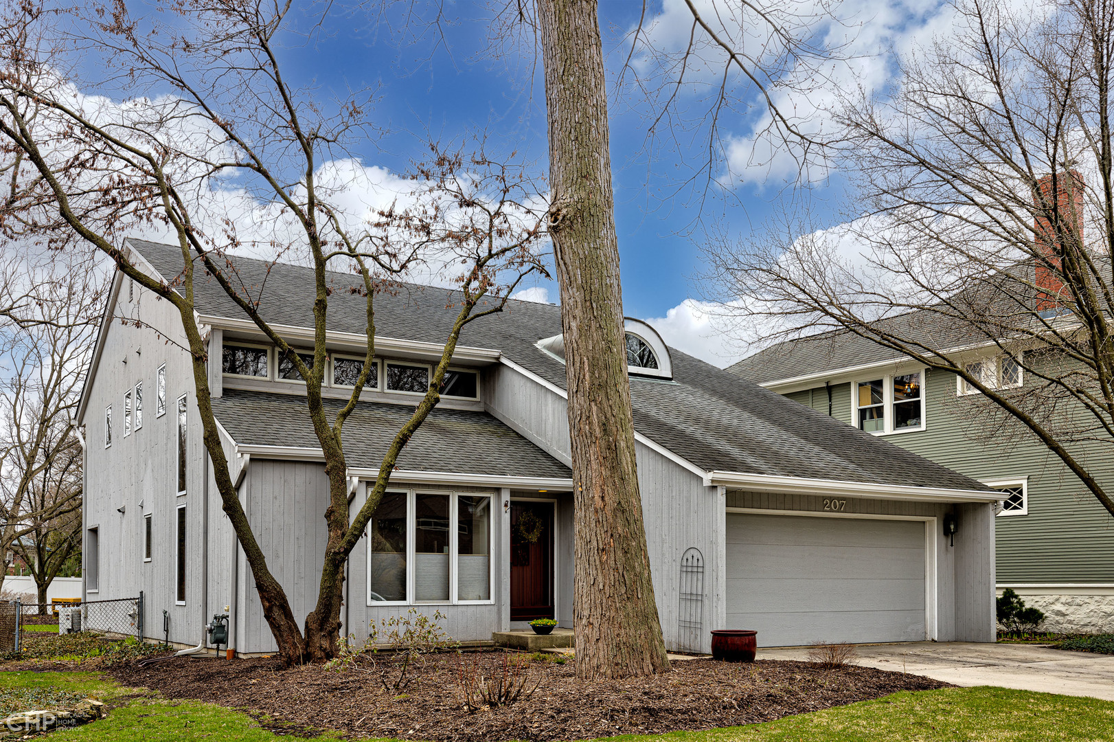 207 Gage Road Riverside, IL 60546 - Photo 3 of 52 a front view of a house with garden