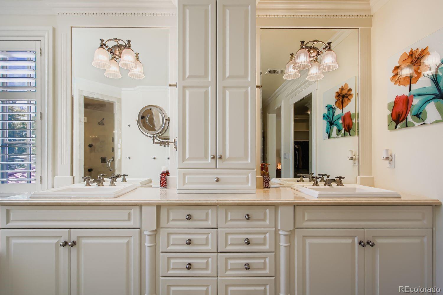 450 Detroit Street Denver, CO 80206 - Photo 16 of 28 a bathroom with a sink vanity and a mirror