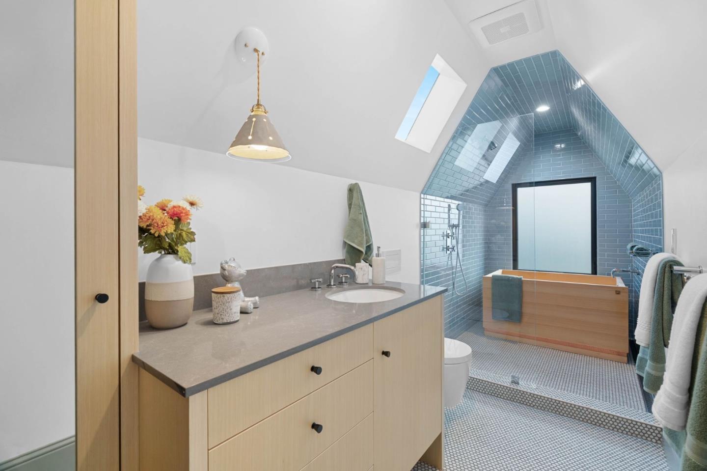 58 Gladys Avenue Mountain View, CA 94043 - Photo 26 of 42 a bathroom with a sink a vanity and mirror