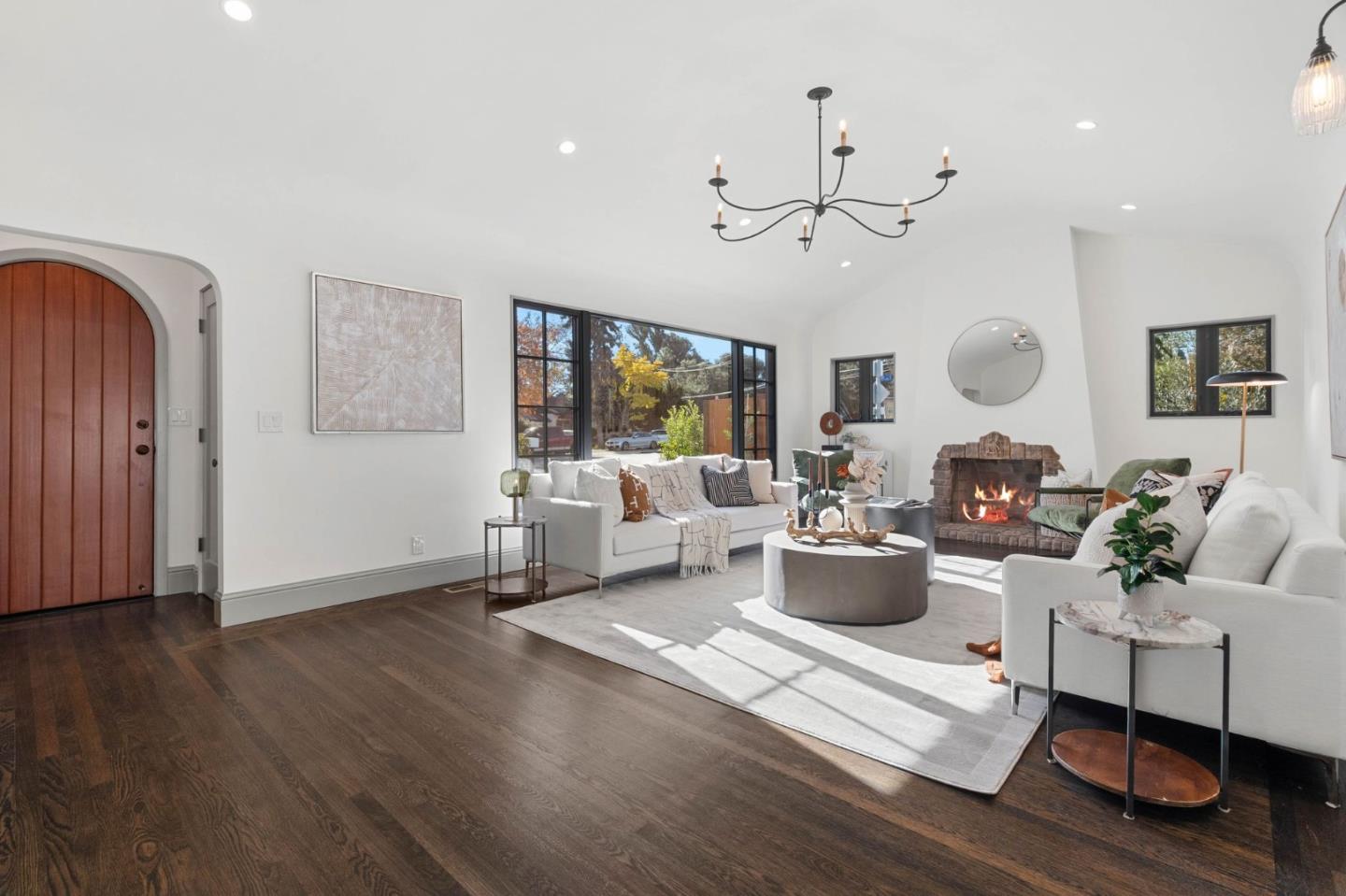58 Gladys Avenue Mountain View, CA 94043 - Photo 8 of 42 a living room with fireplace furniture and a chandelier