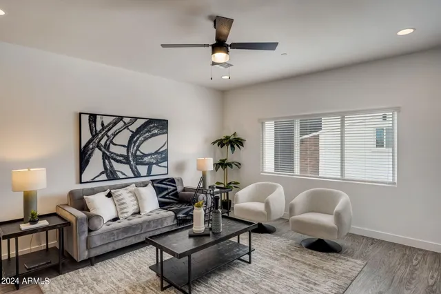 a living room with furniture or window and a table