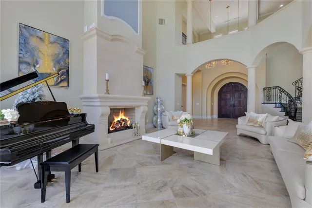 a view of a dining room with furniture and a window
