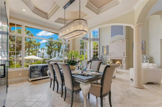 a spacious bedroom with a bed and a flat screen tv