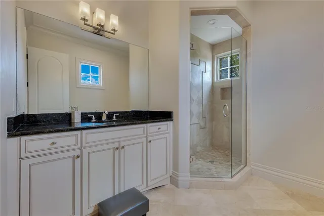 a swimming pool with outdoor seating yard and barbeque oven