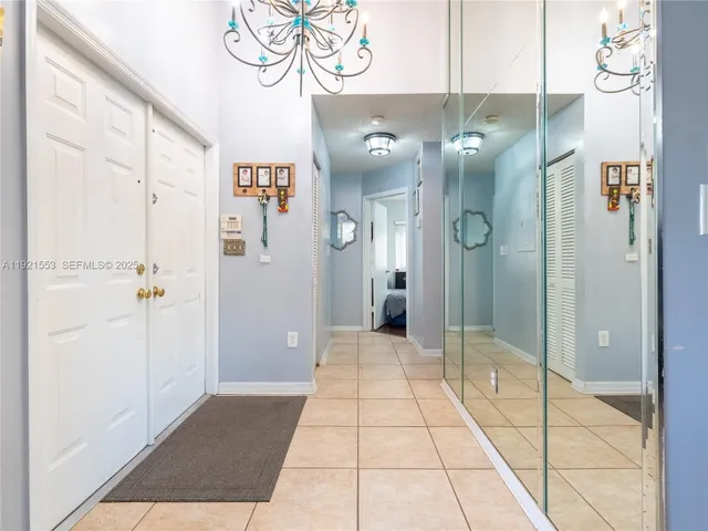 a bathroom with a shower and a mirror