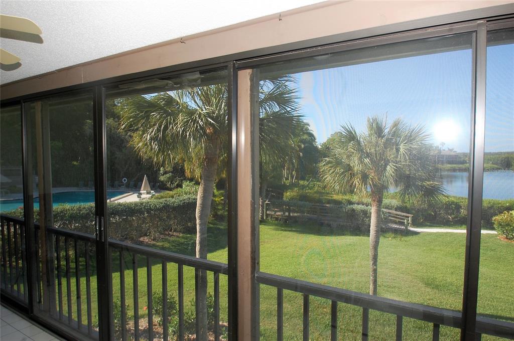 1526 Pelican Point Drive, Unit BA243 Sarasota, FL 34231 - Photo 7 of 24 a view of a glass door