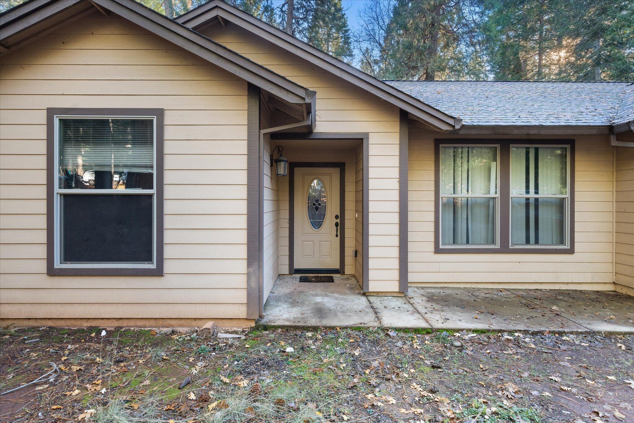 30821 Tinkerbell Lane Shingletown, CA 96088 - Photo 2 of 25 a front view of a house